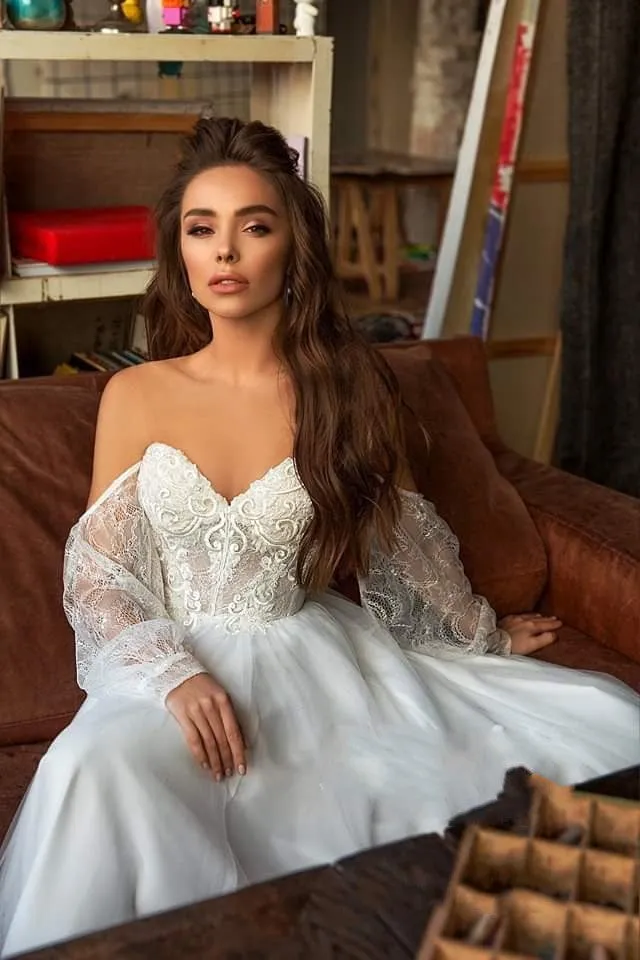 Elegant Bohemian Lace Beach Wedding Dress With Long Sleeves Off The Shoulder And Flowing Skirt