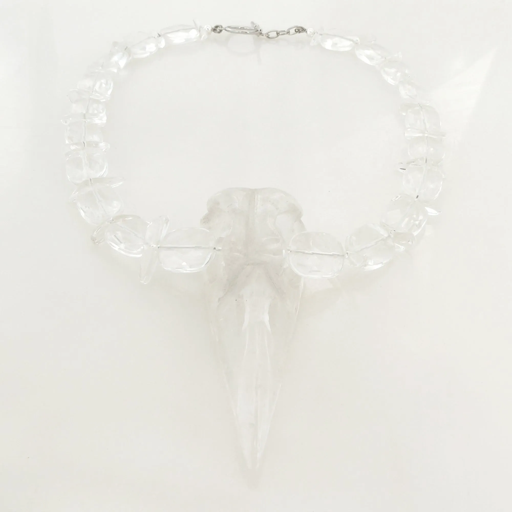 Quartz bird skull necklace
