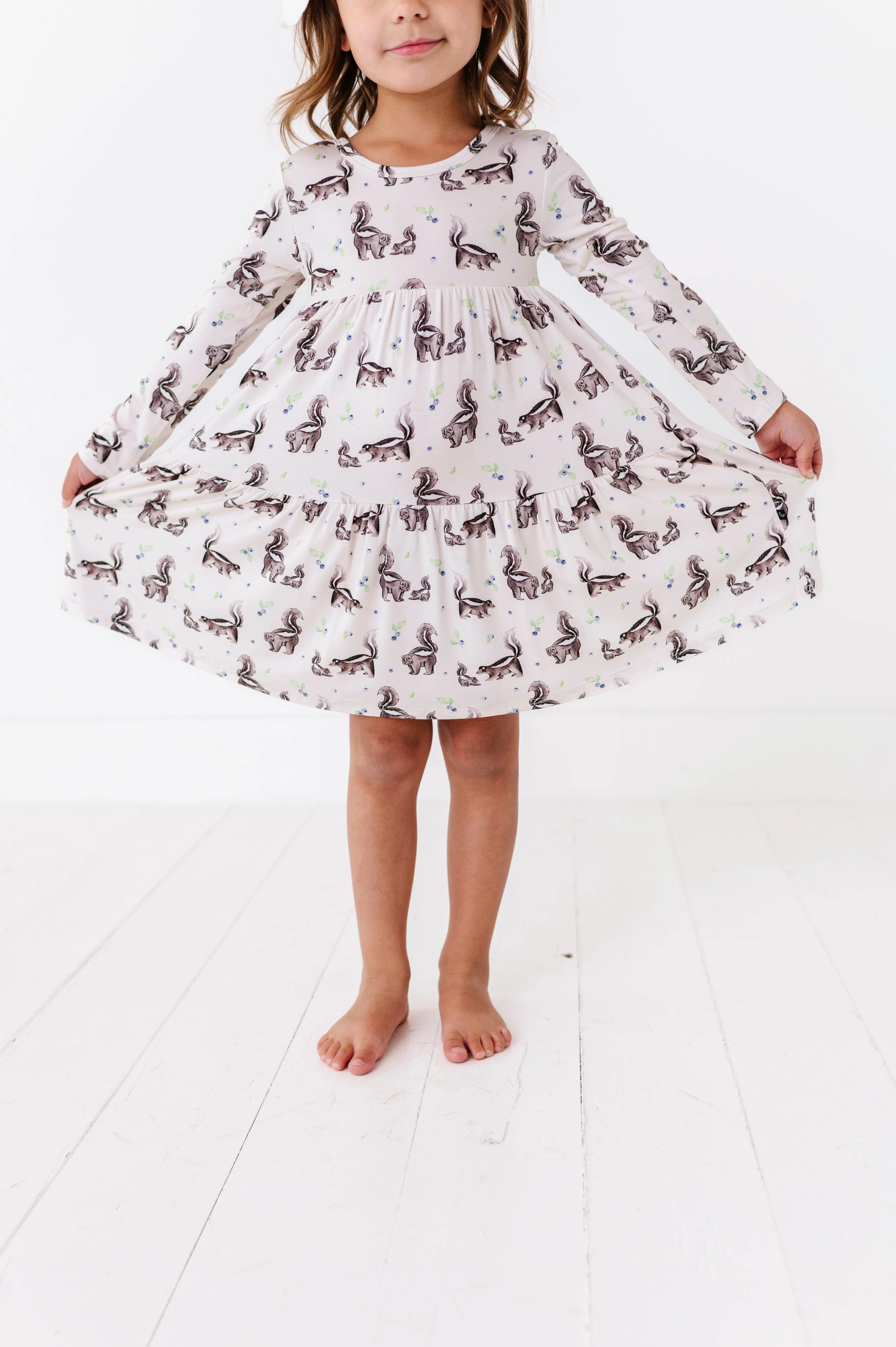 The Sleepy Sloth Berry Stinky Skunk Print Girls Tiered Long Sleeve Twirlie Dress