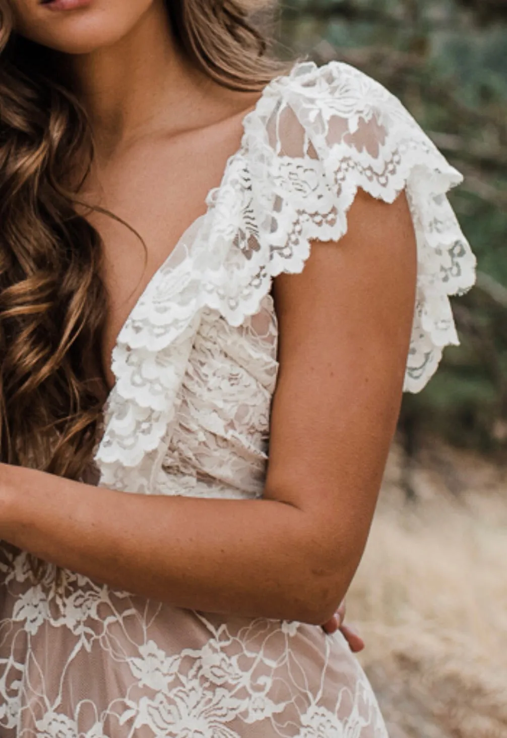 White lace over nude satin dress